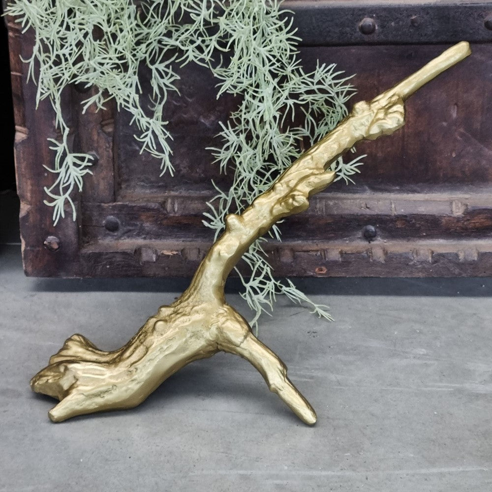 Skulptur, goldfarben besprüht